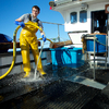Chris Martin cleaning the deck - Newquay, Cornwall